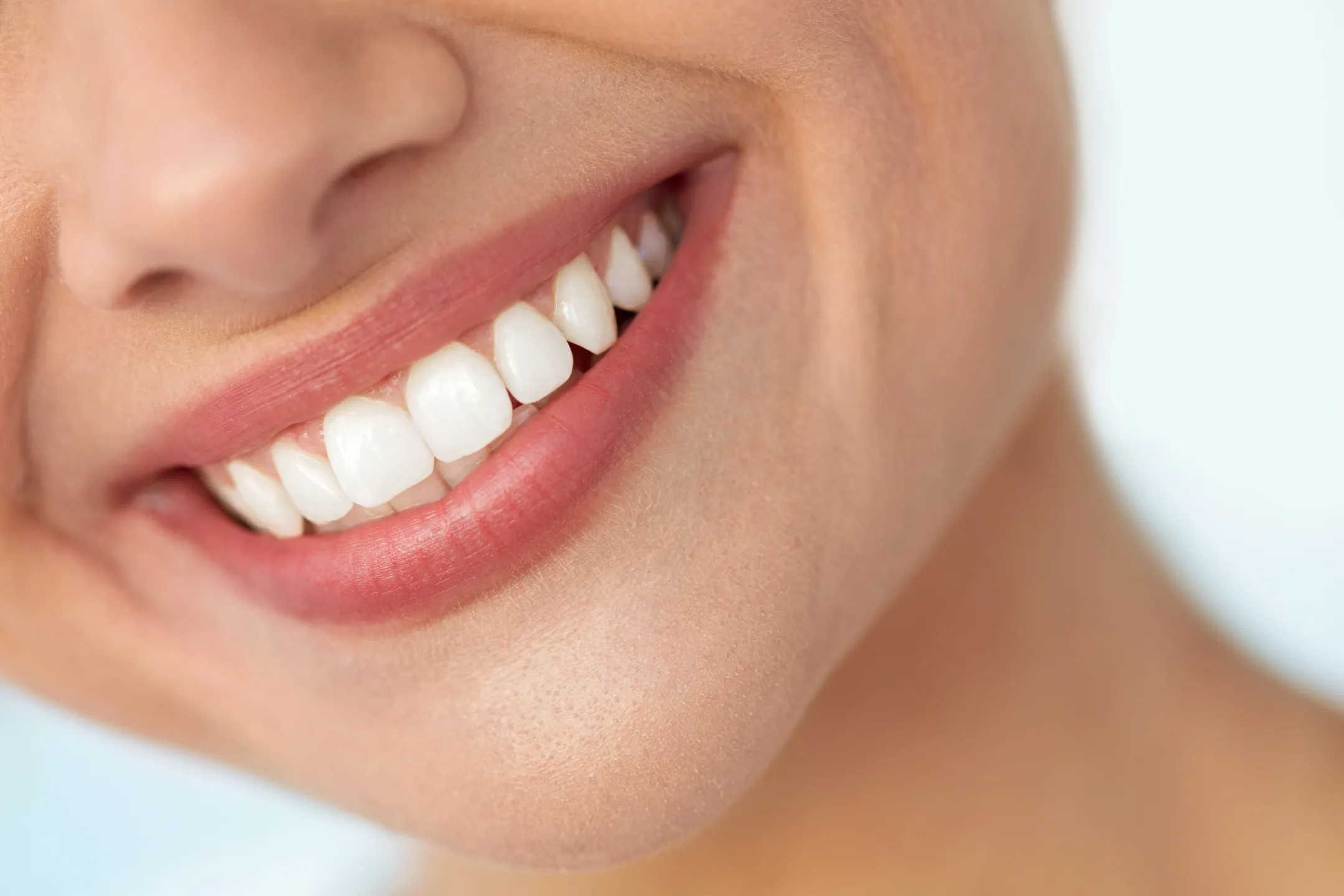Close-up of a healthy, white smile after a smile makeover at Gentle Dental